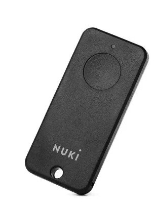 Schwarzer Nuki-Funkschlüssel mit rundem Knopf und Loch zum Anhängen